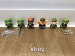 49 Kidrobot figures Ninja Turtles, Simpsons Futurama G. I Joe Transformers Looney